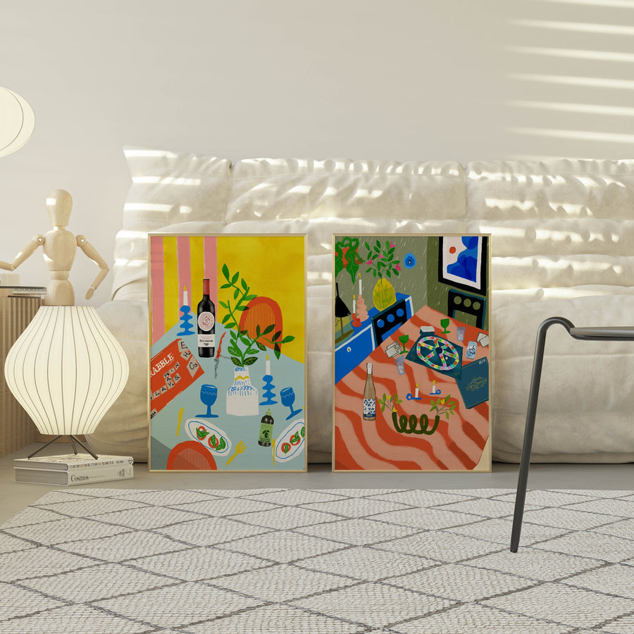 Vibrant art print of a Scrabble board, wine bottle, and blue candlesticks on an Italian dinner table. Bold yellow and blue maximalist wall decor.