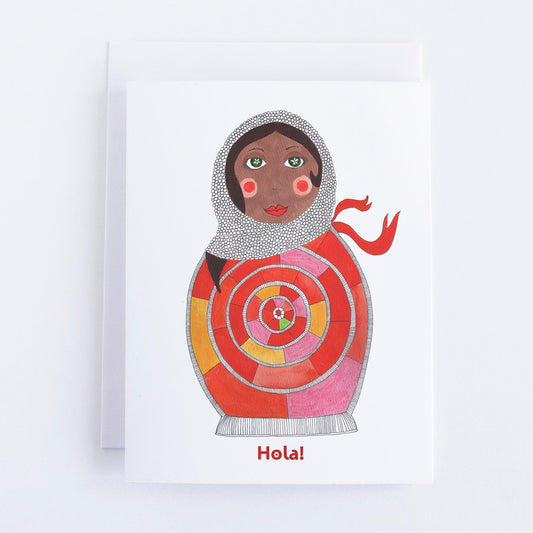 Illustration of a colorful doll with 'Hola!' text on a white background