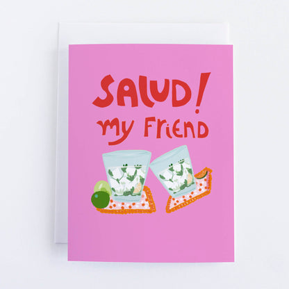 A greeting card with a pink background featuring an illustration of two tequila glasses and a lime, with the text 'Salud! my friend' written in red.